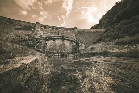 A beautiful view of the old water dam in Zagorze Slaskie, Polandの写真素材