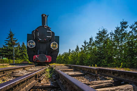 The old disused narrow gauge train locomotive in the museum in Wenecja in Polandのeditorial素材