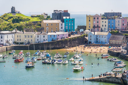 Tenby, Wales - May 2021 : Port and marina in the beautiful little town called Tenby in Pembrokeshire, Carmarthen Bay, Wales, Great Britainのeditorial素材