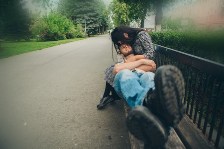 the guy lies at the girl on his kneesの写真素材