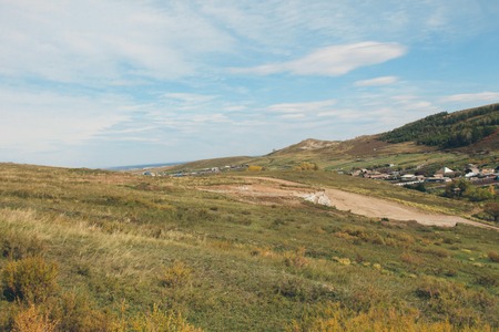Autumn landscape of wildlife: Mountains, plains, sky. Russian natureの写真素材