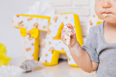 hand of baby food on white background. arm and cakeの写真素材
