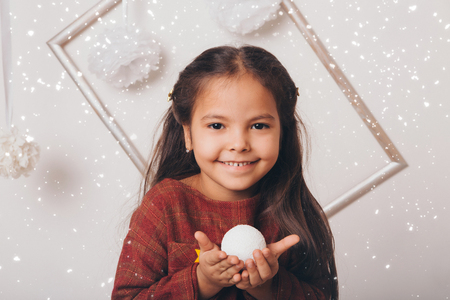 Portrait of a girl on a white backgroundの写真素材