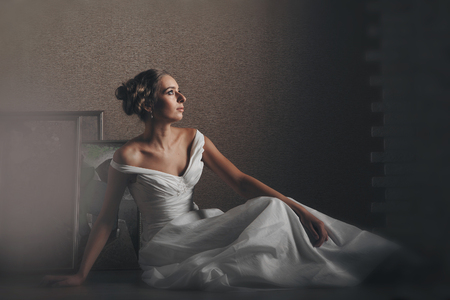 bride, model in beautiful pose photographed in studioの写真素材