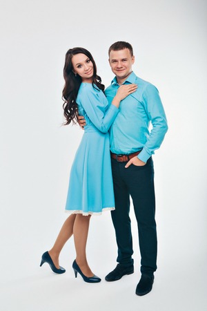 portrait of a man and a woman on a white background. Pair in blueの写真素材