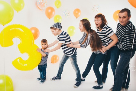 five people lined up on a white background. Business development concept: from small to largeの写真素材