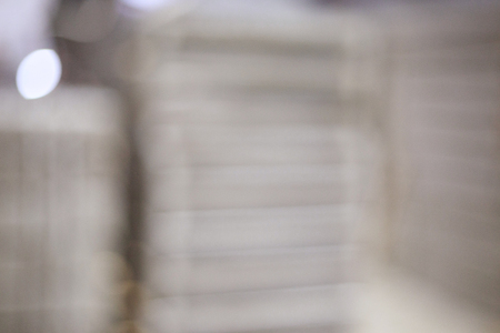 blurred photo: plates stacked on top of each otherの写真素材