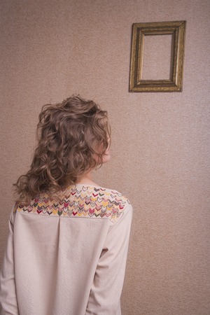 Pattern on the back of the dress embroidered by handの写真素材