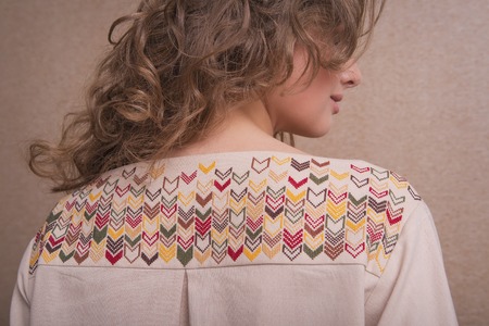 Pattern on the back of the dress embroidered by handの写真素材