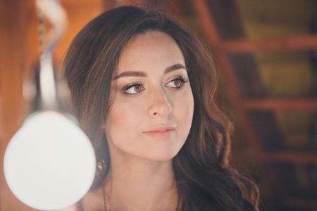 portrait of a beautiful smiling girl with long hair. Face of girl close upの写真素材