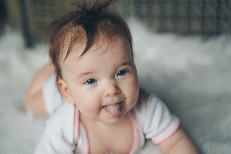 portrait of a little girl: baby's face close-upの写真素材