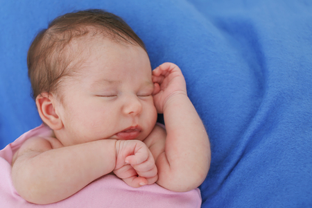 portrait of a little girl: babys face close-upの写真素材