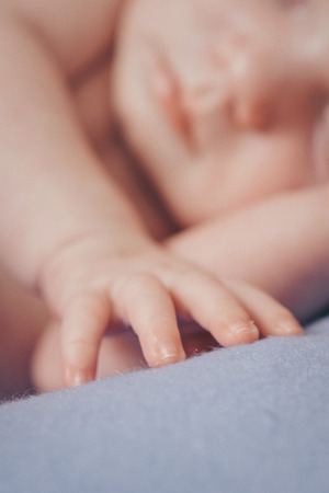 hand's of newborn baby close up onの写真素材