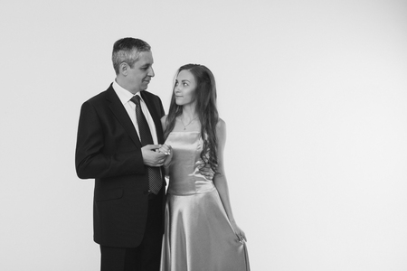 couple in love hugs on white background. man and woman smiling. Valentines dayの写真素材