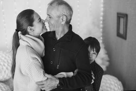couple in love hugs on white background. man and woman smiling. Valentine's dayの写真素材