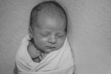 portrait of a little boy: baby's face close-upの写真素材