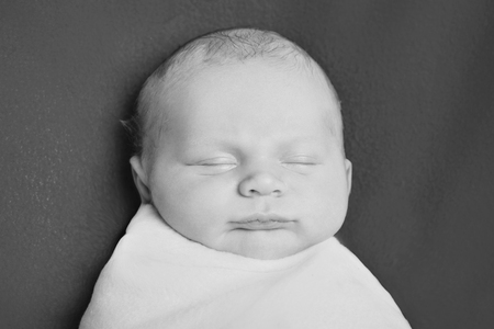 portrait of a little boy: baby's face close-upの写真素材