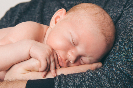 portrait of a little boy: baby's face close-upの写真素材