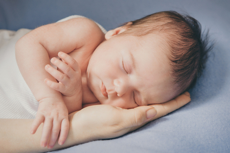portrait of a little girl: baby's face close-upの写真素材
