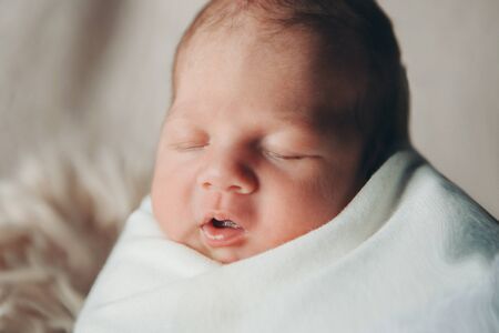 portrait of a little girl: babys face close-upの写真素材