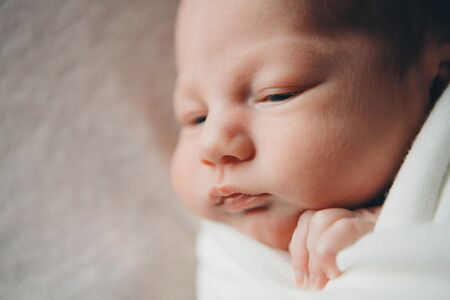 portrait of a little girl: baby's face close-upの写真素材