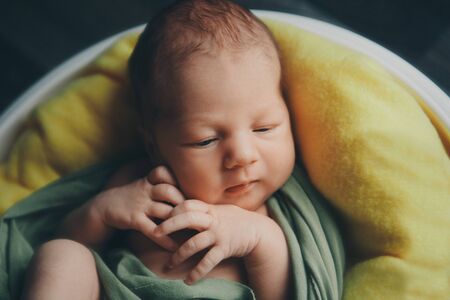 portrait of a little girl: baby's face close-upの写真素材