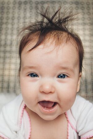 portrait of a little girl: baby's face close-upの写真素材