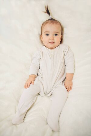 portrait of a happy child on a white backgroundの写真素材