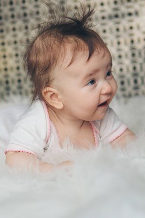 portrait of a little girl: baby's face close-upの写真素材