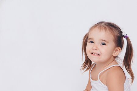 portrait of a happy child on a white backgroundの写真素材
