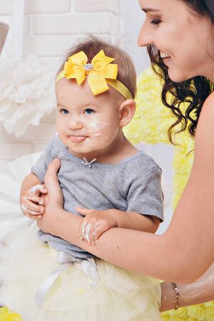 the concept of a healthy lifestyle, the protection of children, shopping - baby in the arms of the mother. Woman holding a childの写真素材