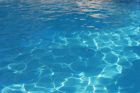 the blue water in the pool close-up. copy spaceの写真素材