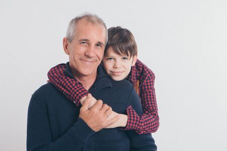Dad holds the baby in his arms. The concept of educating the father of young children, Happy...