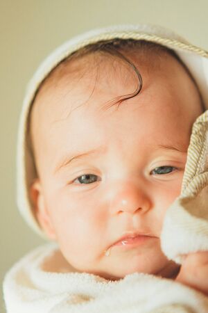 portrait of a little girl: baby's face close-up. concept of childhood, healthcare, IVFの写真素材