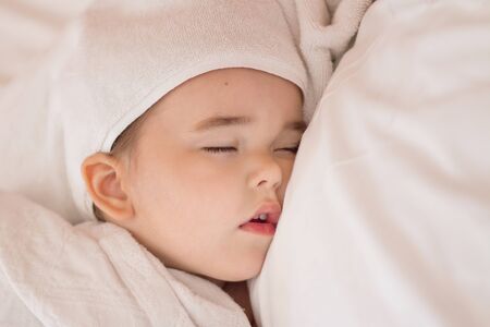 the concept of healthy lifestyle, IVF - a newborn baby sleepsの写真素材