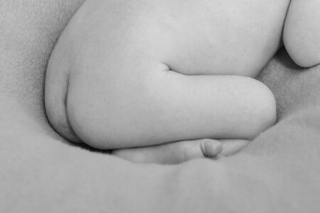 ass of a newborn baby close-up. The concept of health: diseases, IVFの写真素材