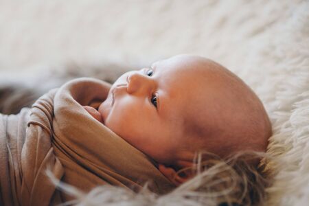 portrait of a little girl: babys face close-up. concept of childhood, healthcare, IVFの写真素材