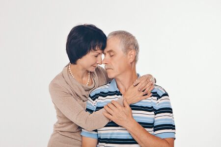 couple in love hugs on white background. man and woman smiling. Valentine's dayの写真素材