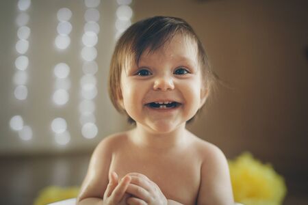 portrait of a little girl: babys face close-up. concept of childhood, healthcare, IVF
