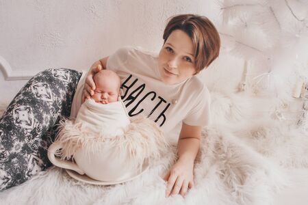 the concept of a healthy lifestyle, the protection of children, shopping - baby in the arms of the...
