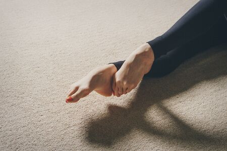 gymnast's legs close up. ballet stand on the toes. sports exercises and stretching: athleticsの写真素材