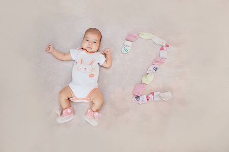 little baby. Figure denoting age. The concept of growing up, IVF, and childhood