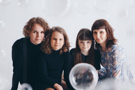 the concept of a healthy lifestyle, the protection of children, shopping - baby in the arms of the mother. Woman holding a child. Isolated on white background. Copy space. 8 march, mother's dayの写真素材