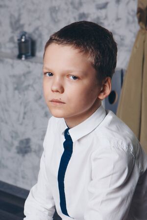 isolated photo: portrait of a serious young guy. the concept of healthy eyes, vision