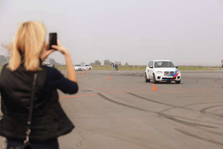 BMW advertising, Moscow, 1.11.2018: demonstration of the car model, cars on the test trackのeditorial素材