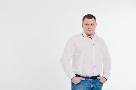 a man in a business suit running and gesturing on white backgroundの写真素材