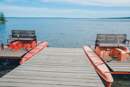 fishing bridge by the river. boat landing on the lake. water and transport