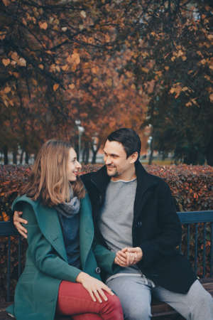 Valentine's day: a couple in love on a Park benchの写真素材