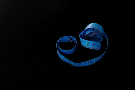 meter blue ribbon on a black background