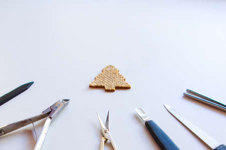 Nail accessories and a small Golden Christmas tree. New year's shopping: manicure set for The new...